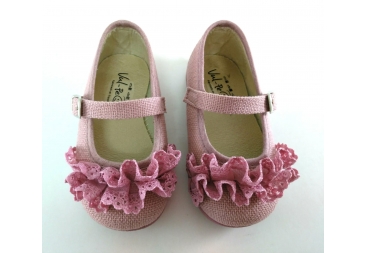 Zapato de niña rosa con correa